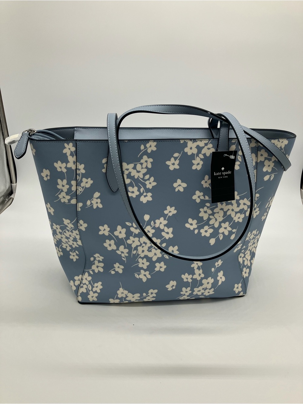 kate spade blue floral tote with cream blossoms